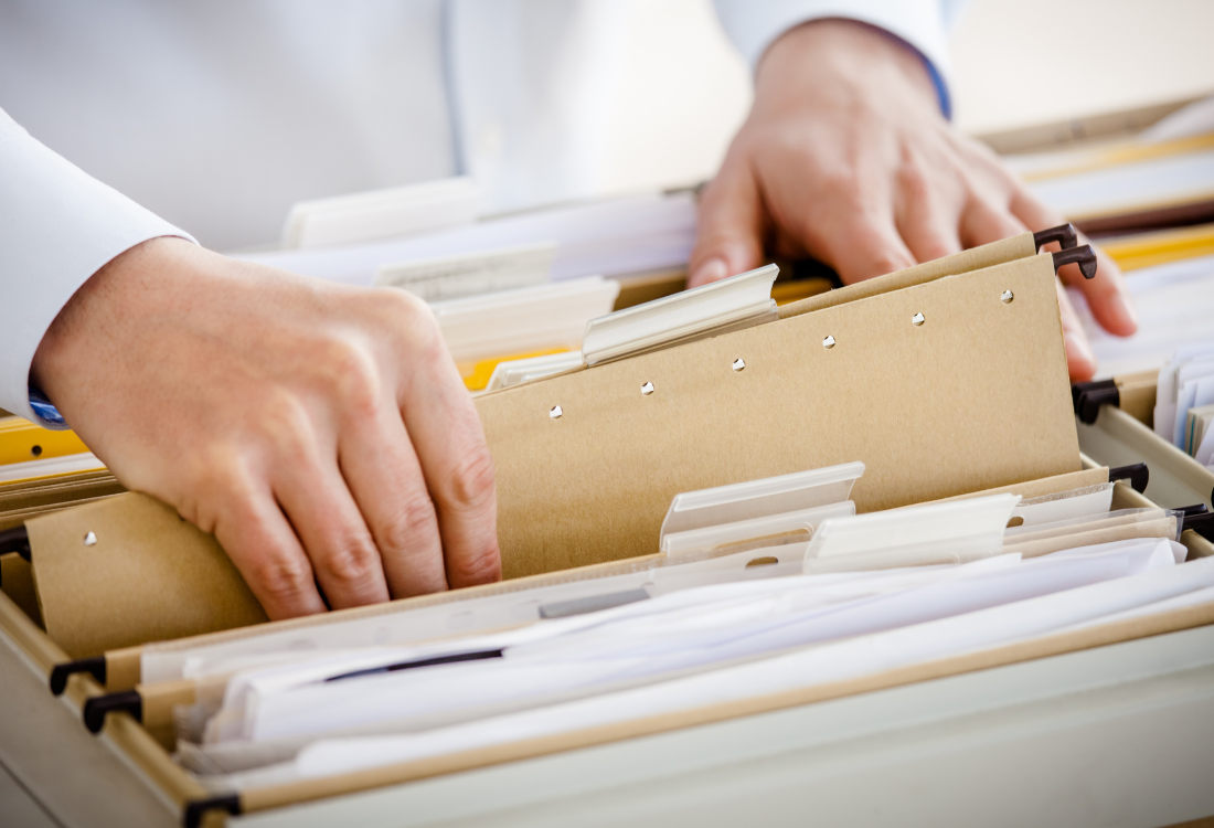 A paper file management system being used in an office.